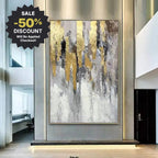 Abstract art painting with gold and gray colors in a modern interior setting, featuring a sale discount offer.