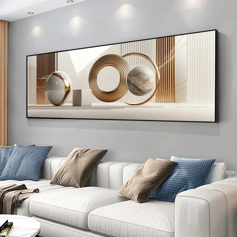 Decorative wall art above a sofa with pillows in a living room setting
