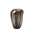 Glass vase with brown and black striped design on a white background