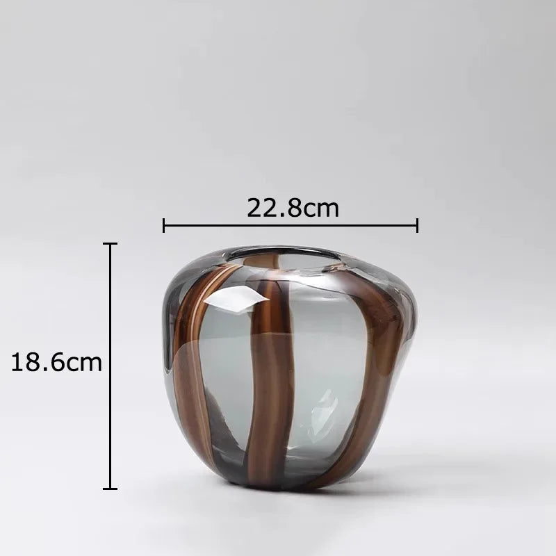 Glass vase with brown and clear stripes and measurements on a white background
