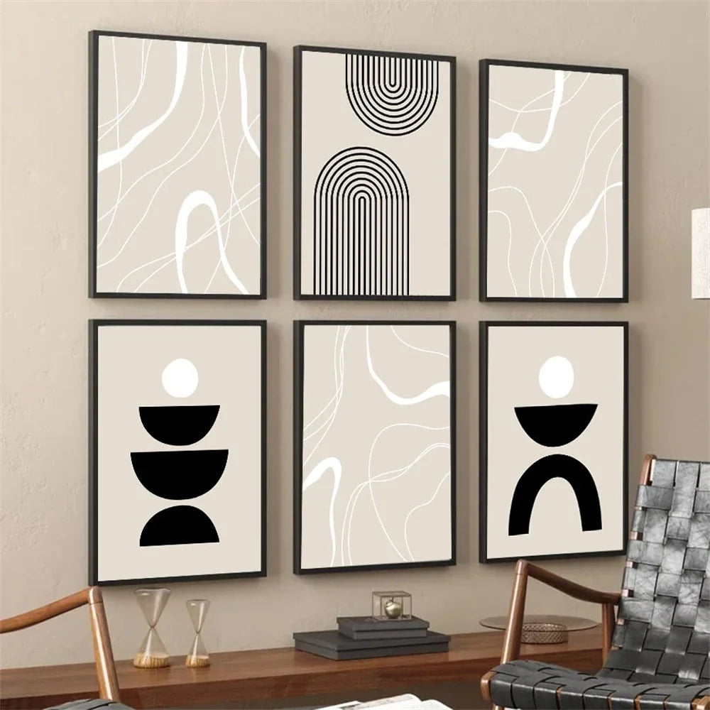 Set of six abstract art prints on a wall in a living room.