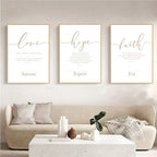 Three framed prints on a wall above a sofa with decorative items.