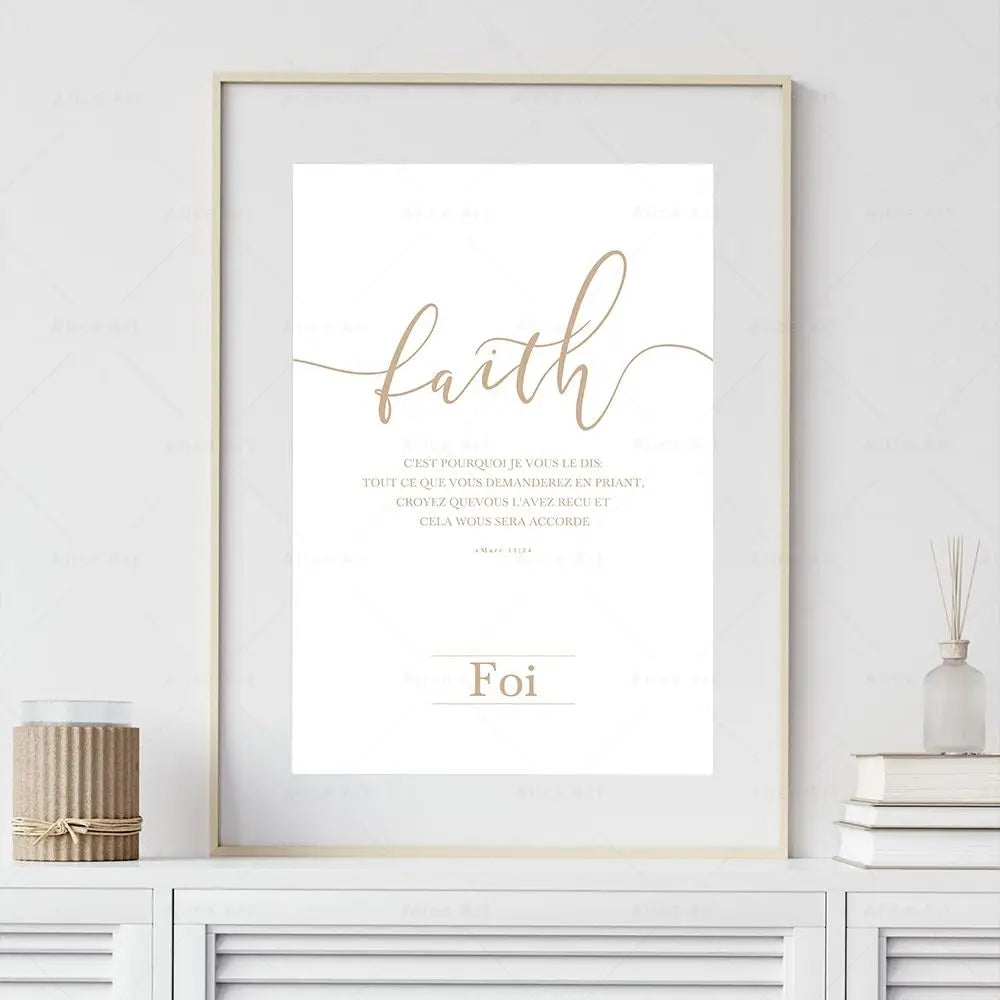 Framed artwork with the word 'faith' on a white wall.