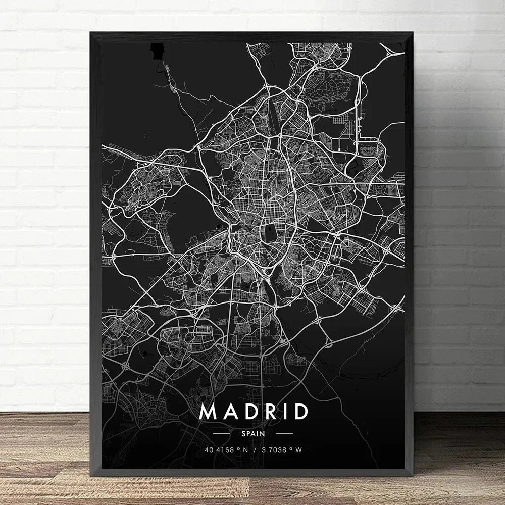 Framed black and white map of Madrid on a brick wall background