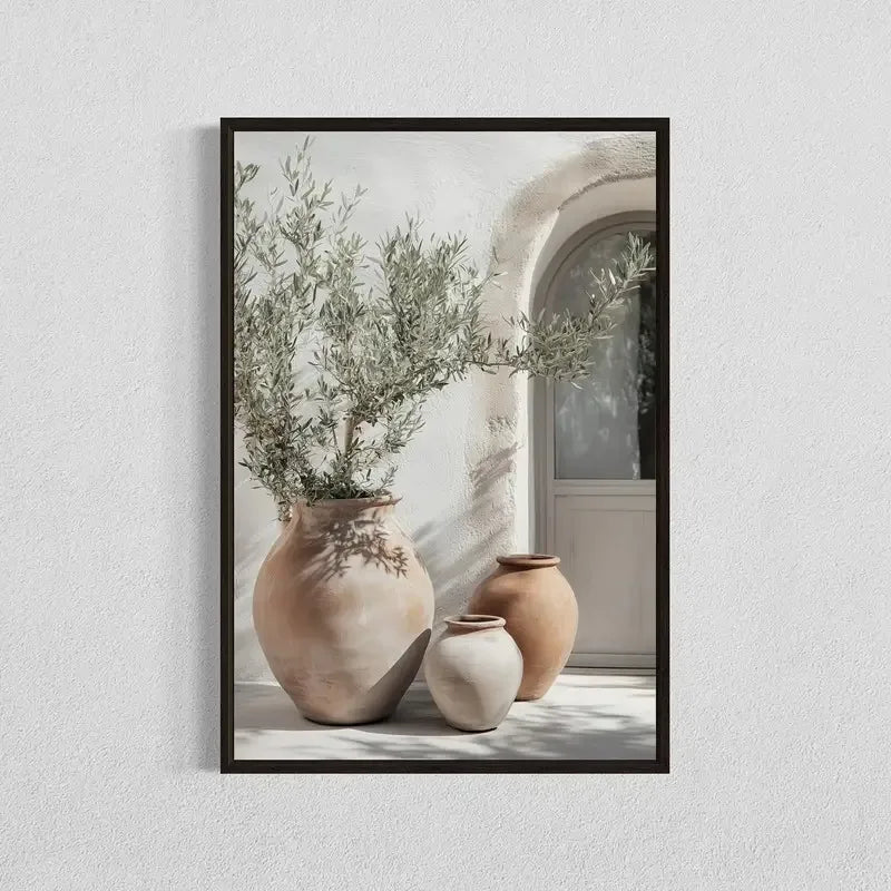 Framed artwork of three terracotta pots with olive branches on a light background