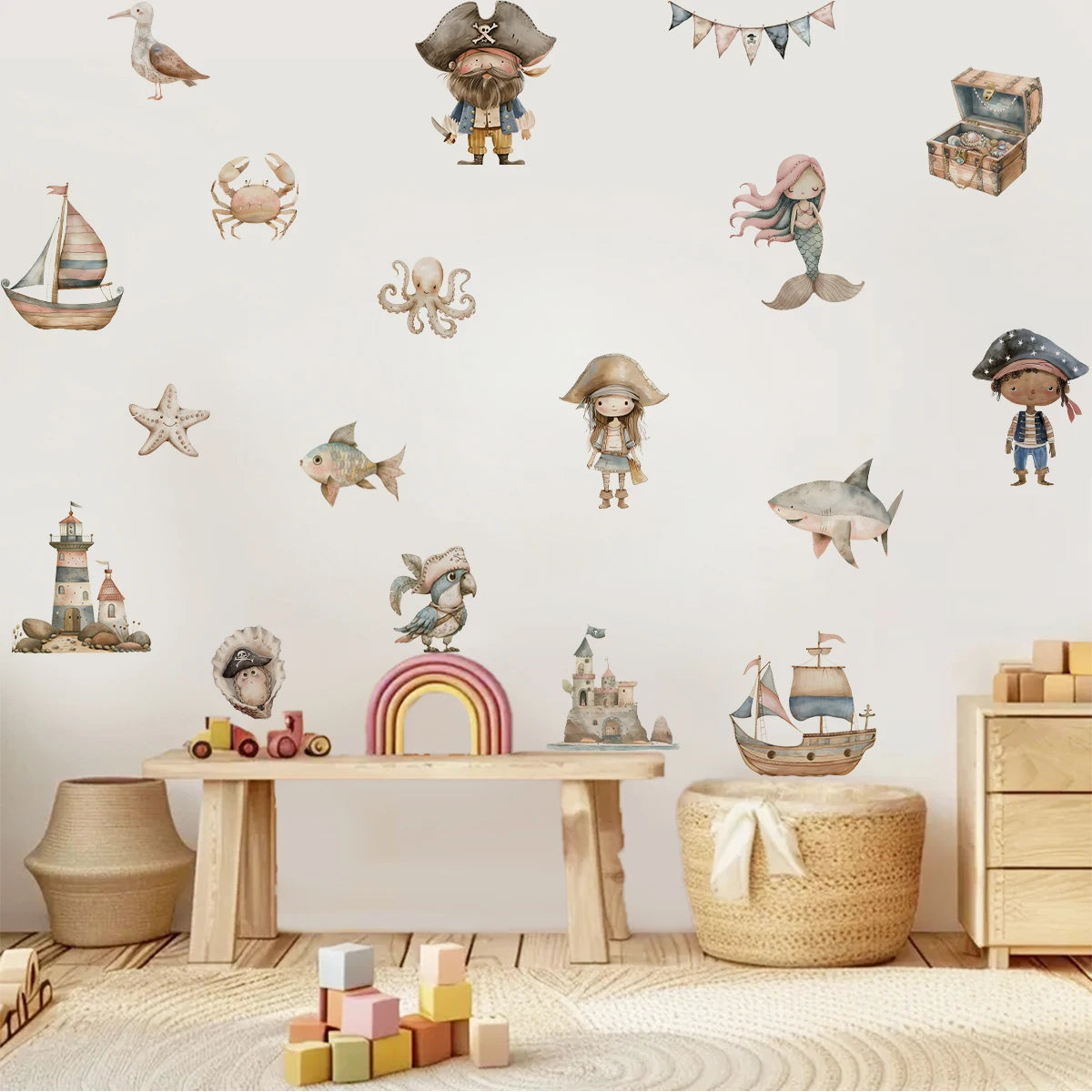 Children's room with pirate-themed wall decals, toys, and wooden furniture.