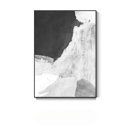 Black and white framed artwork of a waterfall