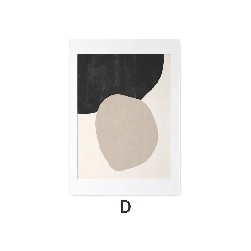 Framed abstract art print with black and beige shapes on a white background