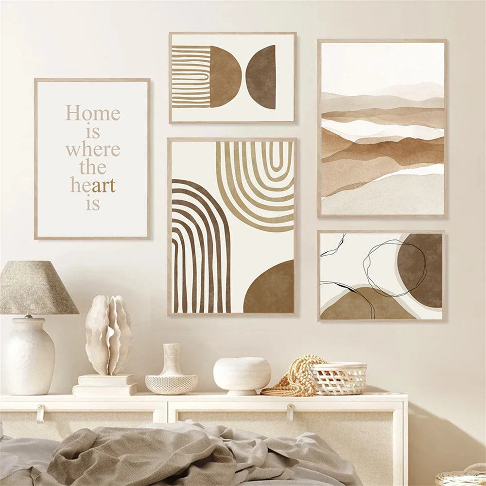 Decorative wall art with abstract designs and a motivational quote on a neutral background.
