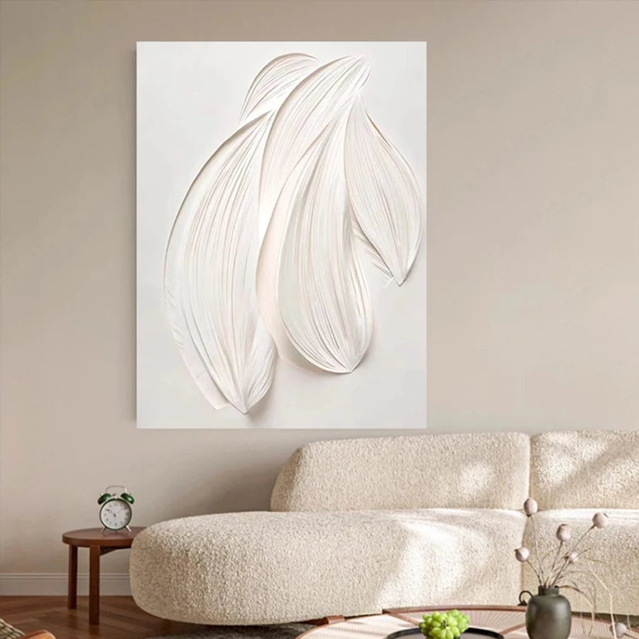 Abstract wall art piece on a beige wall above a sofa