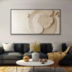 Modern living room with abstract wall art and decorative items.