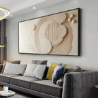 Modern living room with a large abstract wall art piece above a gray sofa.