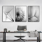 Modern office with black and white dandelion art on the wall