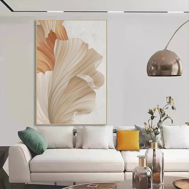 Modern living room with a white sofa, abstract wall art, and decorative elements.