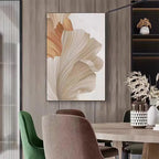 Dining room with abstract wall art, chairs, and a table.