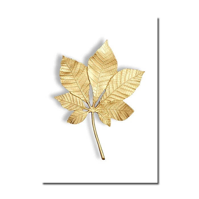 Gold leaf-shaped decorative item on a white background