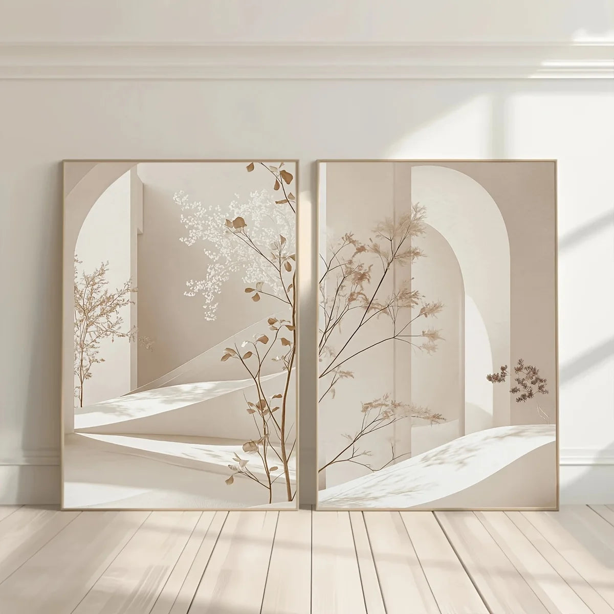 Two framed abstract artworks with floral elements on a wall.