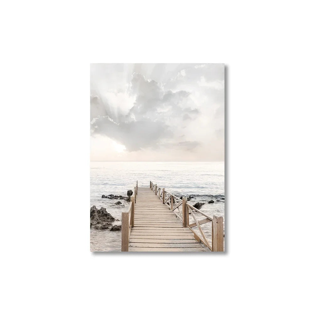 Wooden dock extending into the ocean with a cloudy sky above