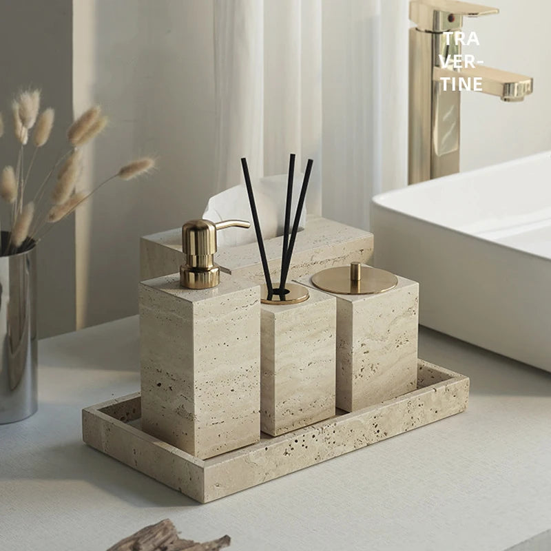 Bathroom accessories set on a tray with decorative elements in a modern bathroom setting.