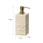 Square soap dispenser with gold pump and measurements on a white background