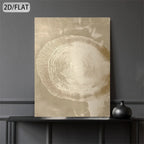 Decorative wall art of a tree stump with concentric rings on a dark surface against a gray wall.