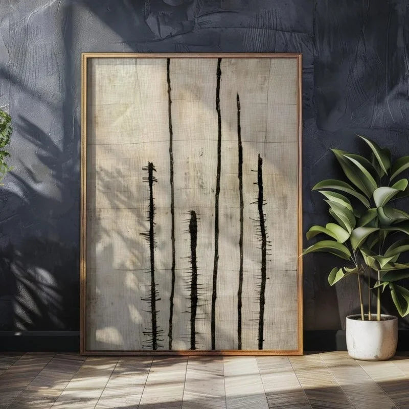 Organic abstract artwork with black lines on a textured wall, accompanied by a potted plant.