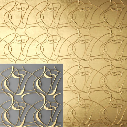 Decorative gold metal panel with abstract pattern on a textured surface.