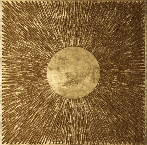 Decorative sunburst design in gold on a textured background