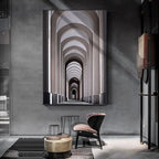 Modern interior with a large abstract wall art piece and a chair.