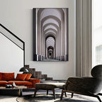Modern living room with a geometric wall art piece.