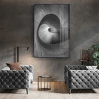 Modern living room with gray tufted chairs and a large abstract painting on the wall.