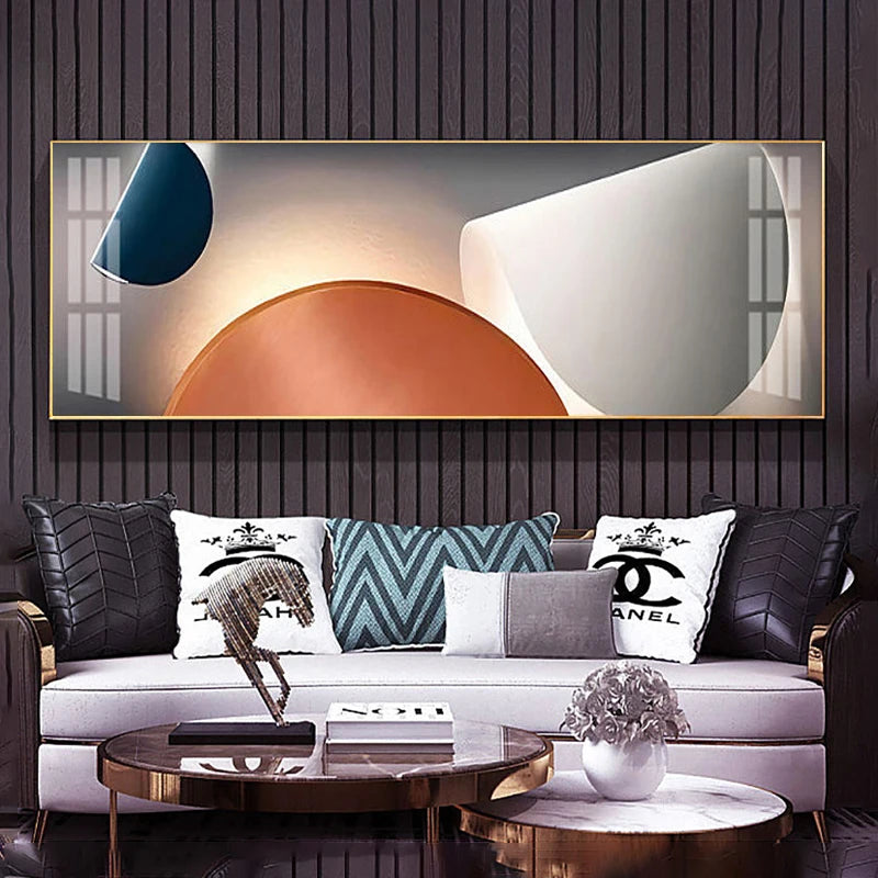 Modern living room with a large abstract painting, white sofa, and decorative pillows.