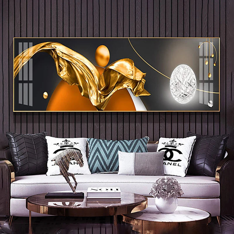 Decorative wall art with gold abstract design in a living room setting.