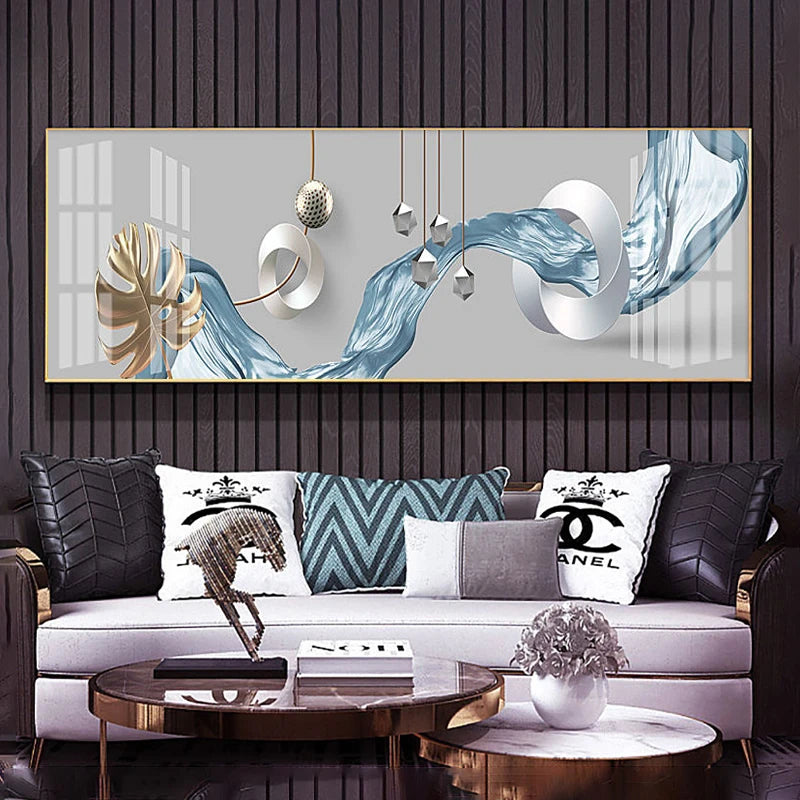 Modern living room with abstract wall art and decorative pillows.