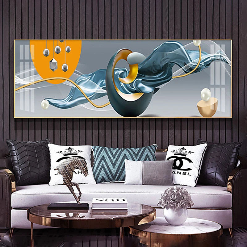 Modern living room with abstract wall art and decorative pillows.