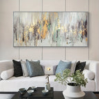 Living room with a white sofa, decorative pillows, a coffee table, and a large abstract painting on the wall.