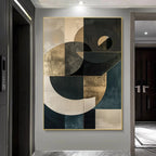 Abstract art piece on a wall in a modern interior setting