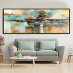 Living room with a gray sofa, abstract painting on the wall, and small table with decor items.