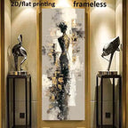 A tall vertical abstract wall art print featuring a stylized female figure in black, gray, white, and gold tones, displayed between two decorative sculptures in a modern interior setting. Text at the top reads '2D/flat printing' and 'frameless'.