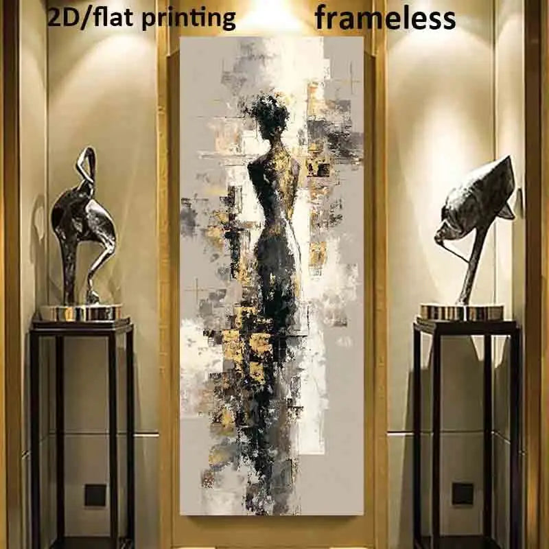 A tall vertical abstract wall art print featuring a stylized female figure in black, gray, white, and gold tones, displayed between two decorative sculptures in a modern interior setting. Text at the top reads '2D/flat printing' and 'frameless'.