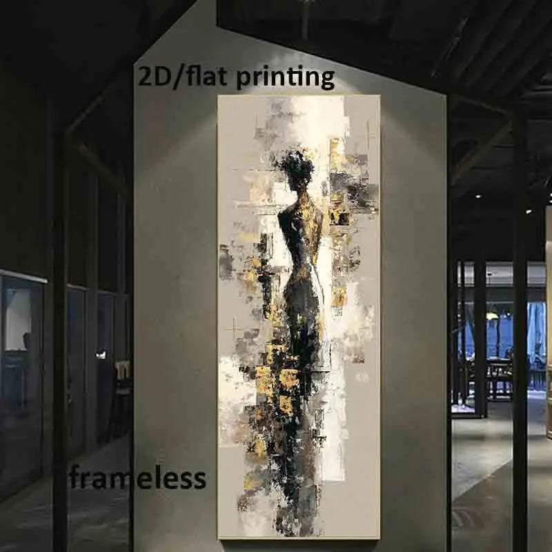 A vertical abstract canvas print featuring a stylized female figure in black, gray, white, and gold tones, displayed on a wall in a modern interior setting.