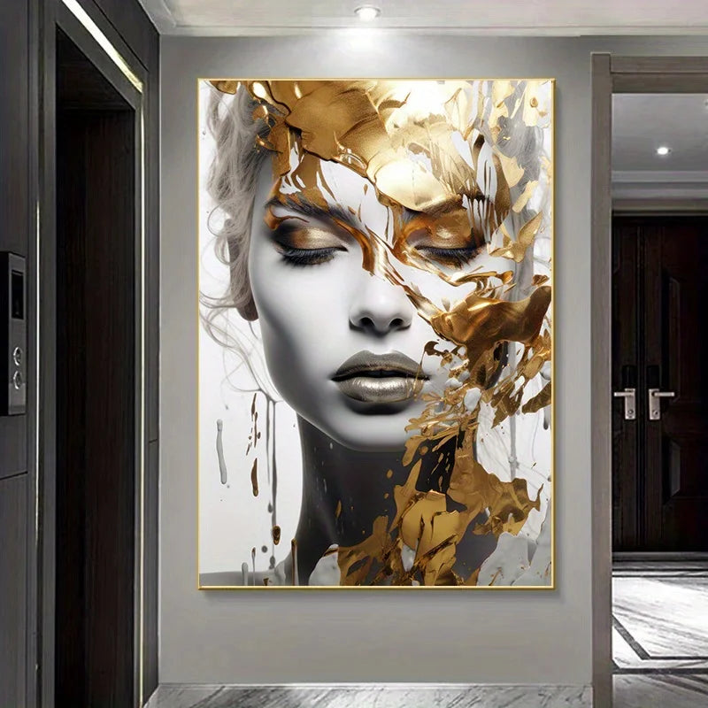 Abstract art of a woman's face with gold and black elements on a wall in a modern interior setting.