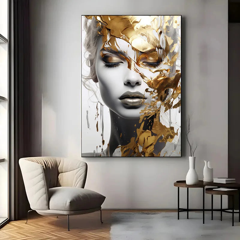 Modern interior with a large abstract painting of a woman's face on a wall, featuring gold and black elements.