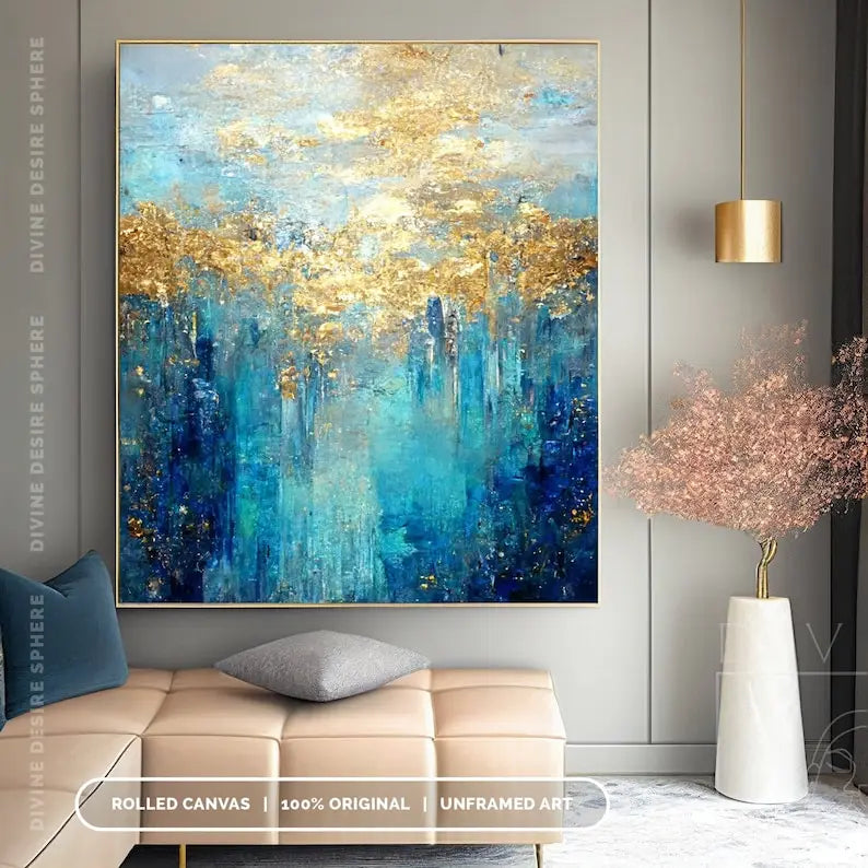 Abstract painting with blue and gold tones in a modern living room setting.