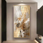 Abstract art painting with gold and white tones on a wall in a modern interior setting.