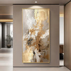 Abstract art painting with gold and white tones in a modern interior setting.