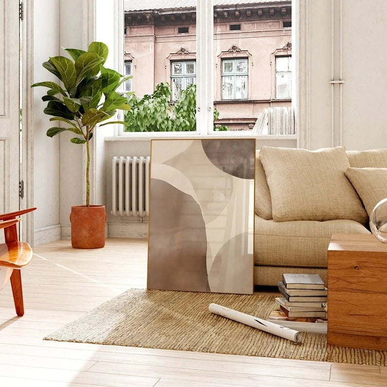 Modern living room with beige sofa, wooden coffee table, and decorative items.