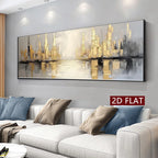 A large panoramic framed canvas print of a golden city skyline with water reflections, displayed on a gray wall above a modern white sofa with blue and beige pillows. A red label on the right reads '2D FLAT'.
