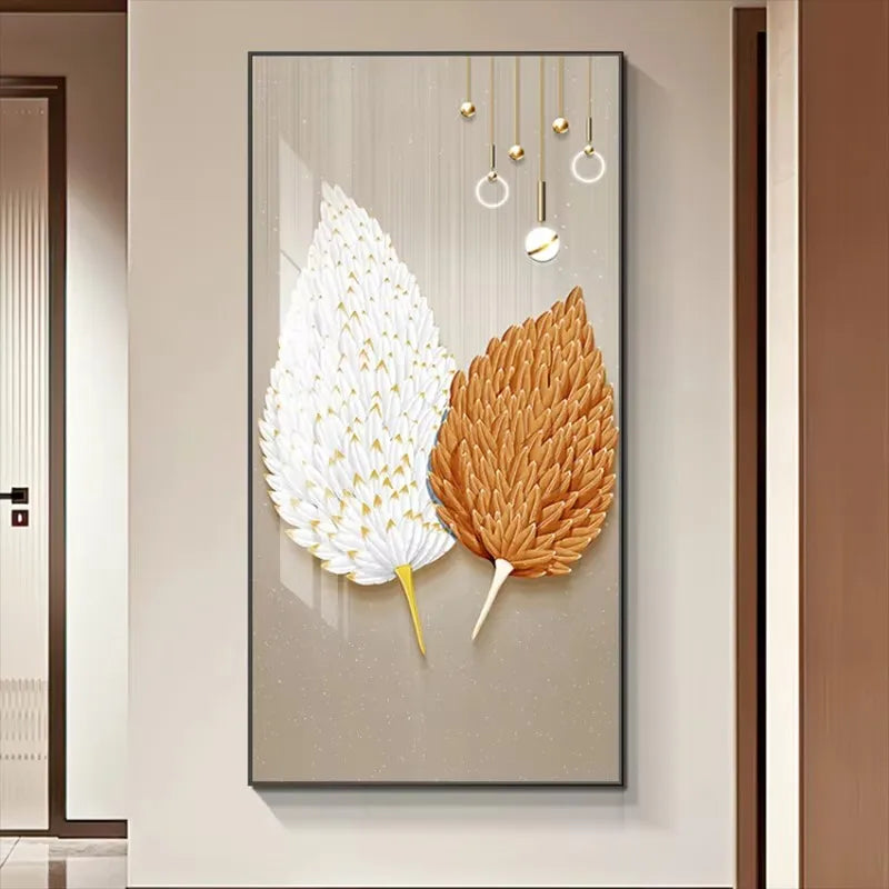 Decorative wall art with two leaves on a neutral wall.