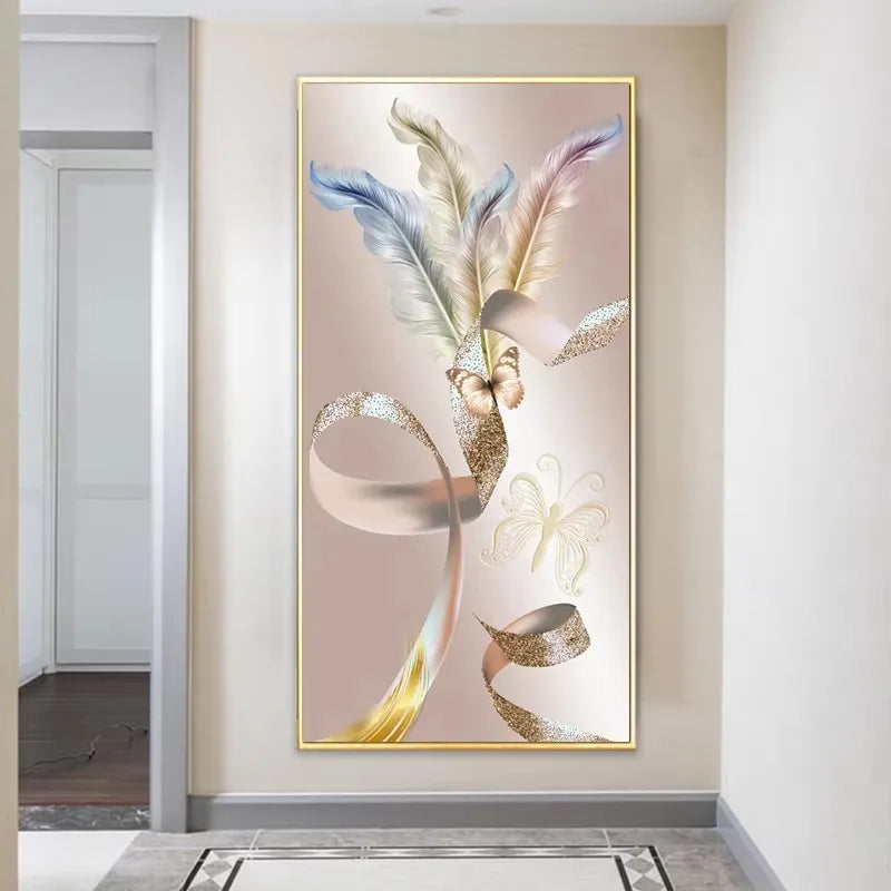 Decorative wall art with abstract design in a gold frame on a beige wall.